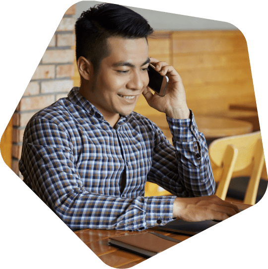 smiling-outsource-administration-employee-phone-call-with-client