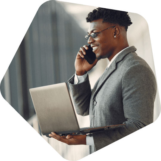 smiling-outsource-sales-team-member-holding-his-laptop