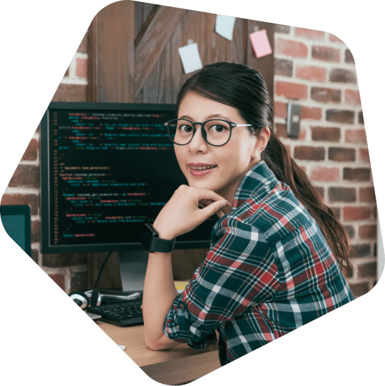 offshore-web-development-employee-working-at-her-desk