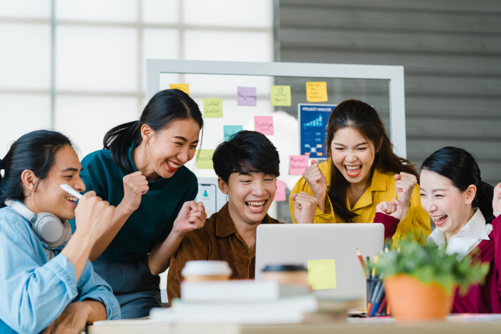 Group of young asian people excited for the offshoring for business opportunity.