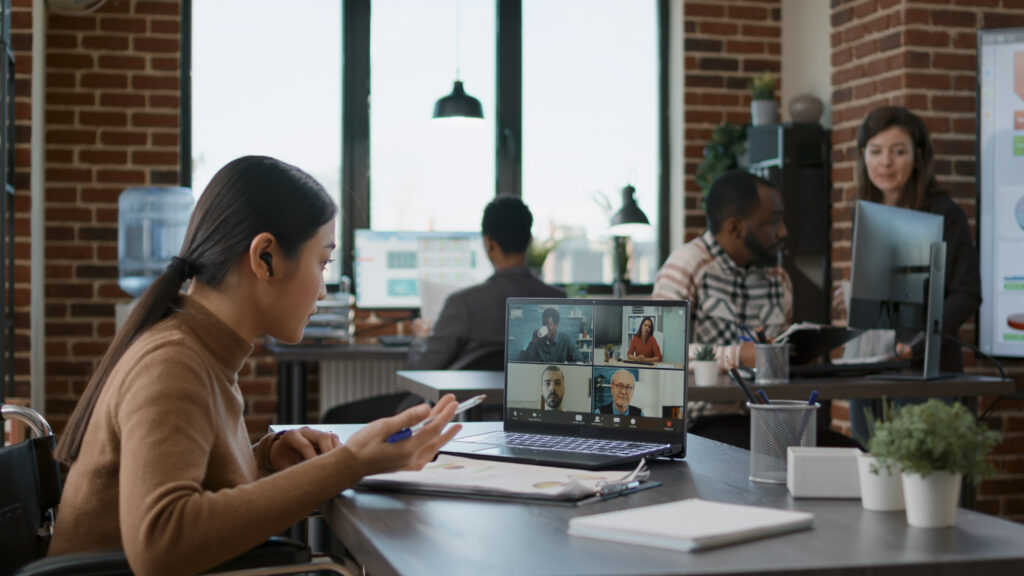 colleagues overcoming remote work challenges by strategising on innovation across borders.