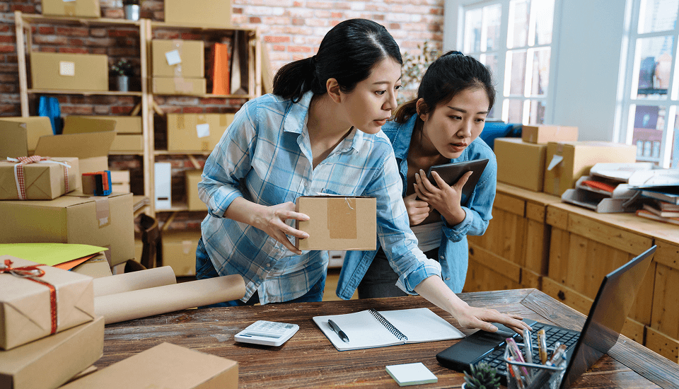 two people researching the headless commerce features