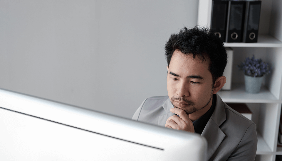 Person comparing the Cons of BNPL to E-commerce Business
