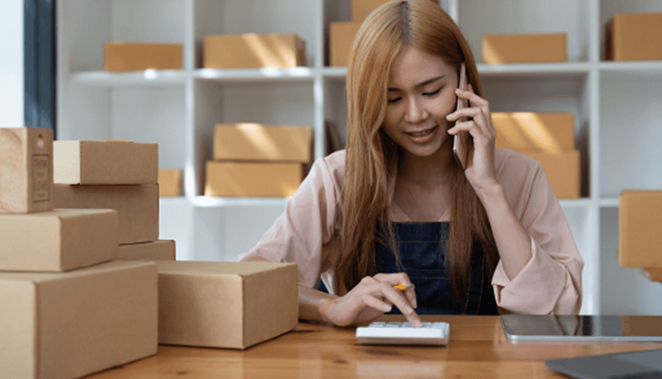 Girl talking to a customer representative about the tips on outsource supply chain management