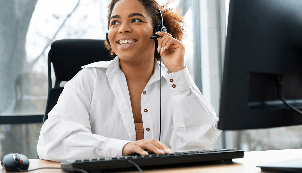 E-commerce customer service representative talking happily to customers