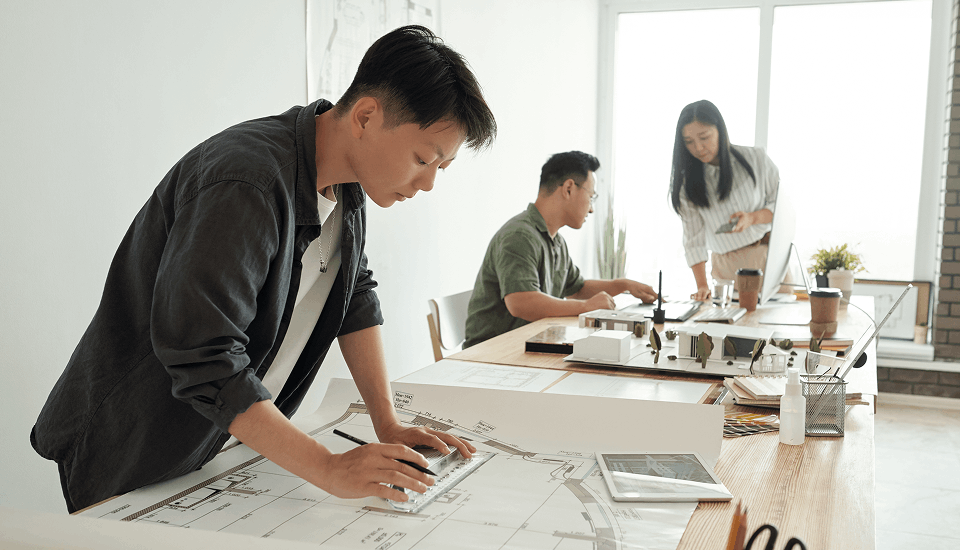 Outsourced staff working on house model for 3d printing