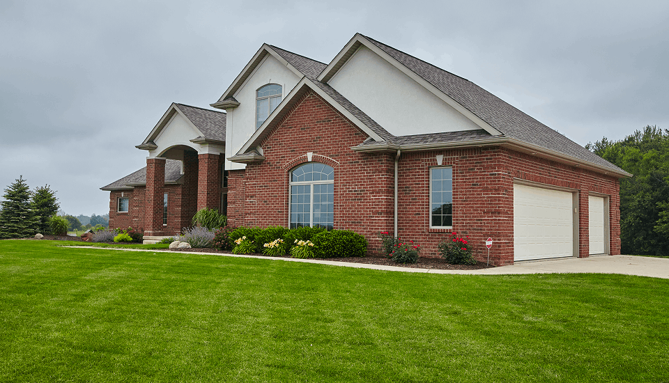 Brick house showcasing the future of construction outsourcing