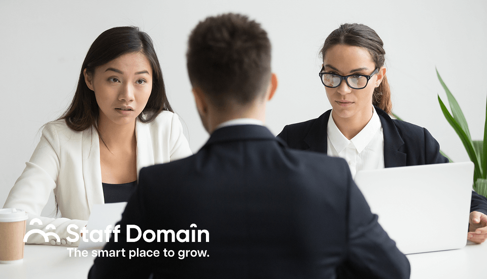 2 HR officers interviewing e-commerce administrators