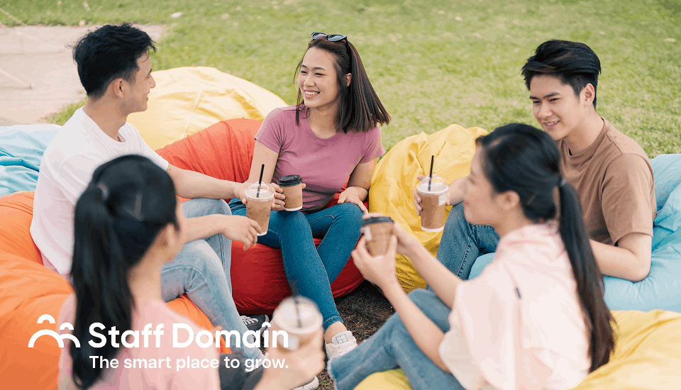 Employees bonding over a picnic setup
