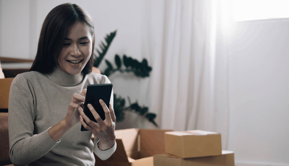 Female doing some online shopping and utilising the one-click ordering