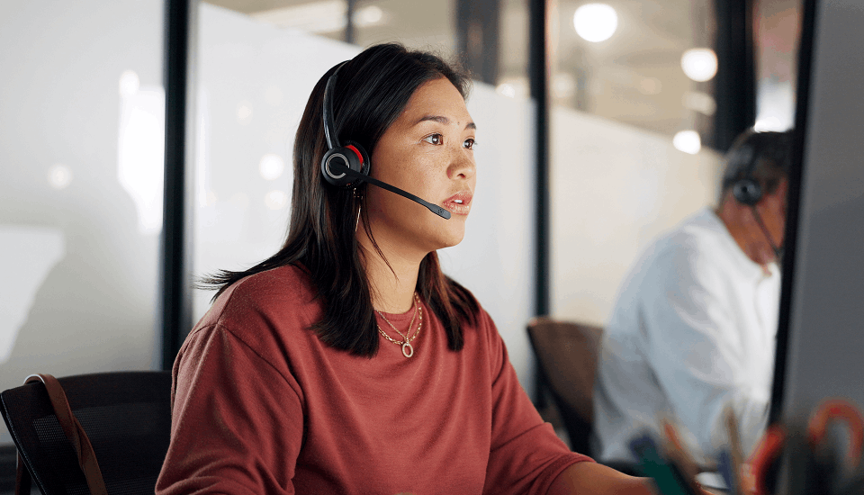 Employee studying AI chatbot for e-coimmerce
