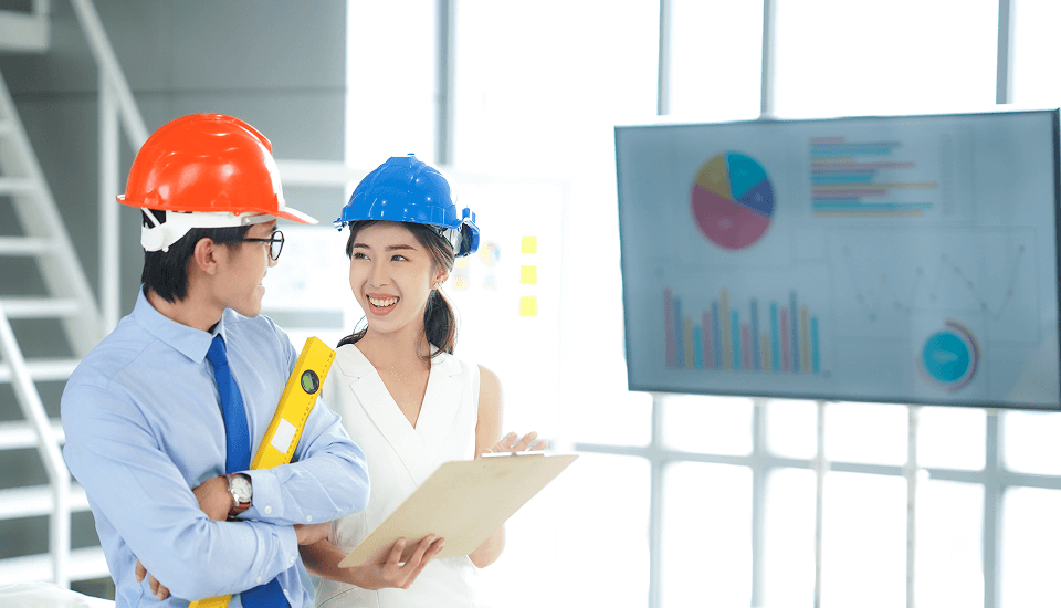 2 engineers studying to reduce infrastructure and operational costs by outsourcing engineering tasks.