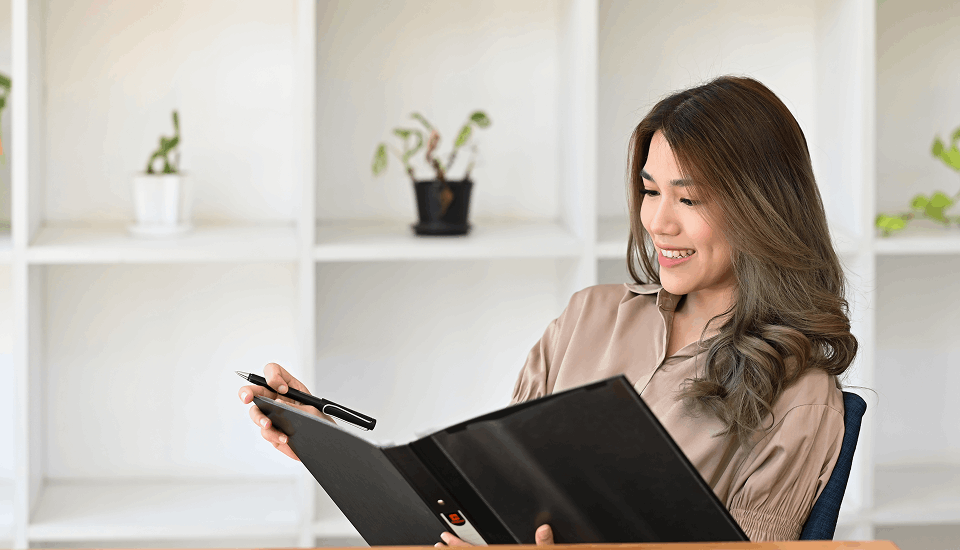 Female reviewing her CV for an interview