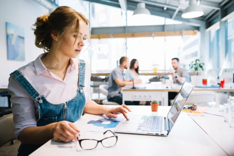 Female working as an offshore employee on her laptop