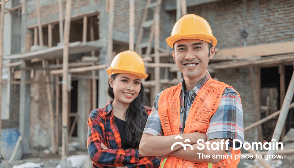 Two engineers happy because they overcame the Australia Construction Workforce Gaps
