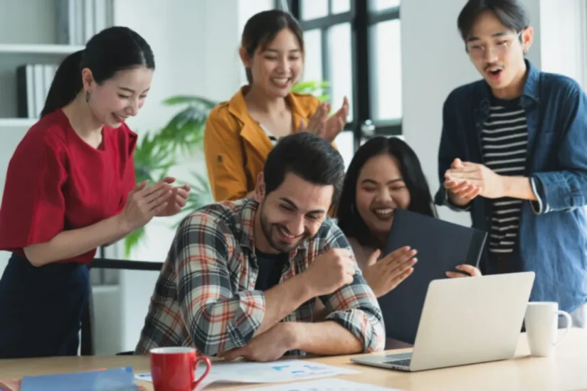 Happy productive team enjoying their moment
