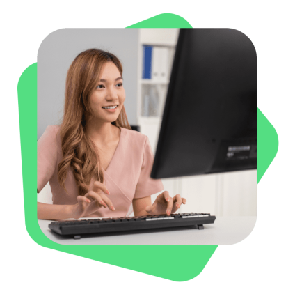 thumbnail-smiling-outsourced-marketing-services-employee-working-at-her-desk